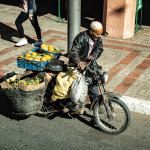Moped med apelsiner
